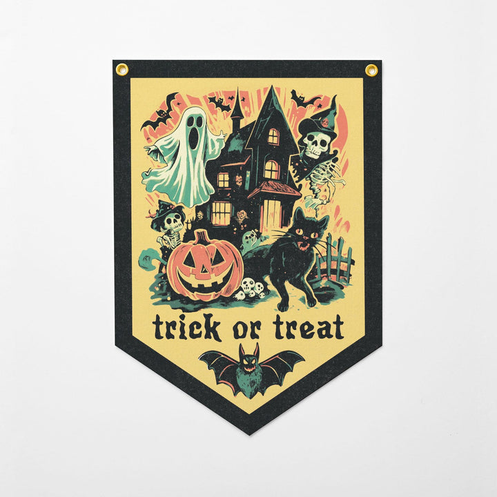A Halloween-themed banner with a spooky house, ghost, skeleton, cat, pumpkin, bats, and the text "trick or treat".
