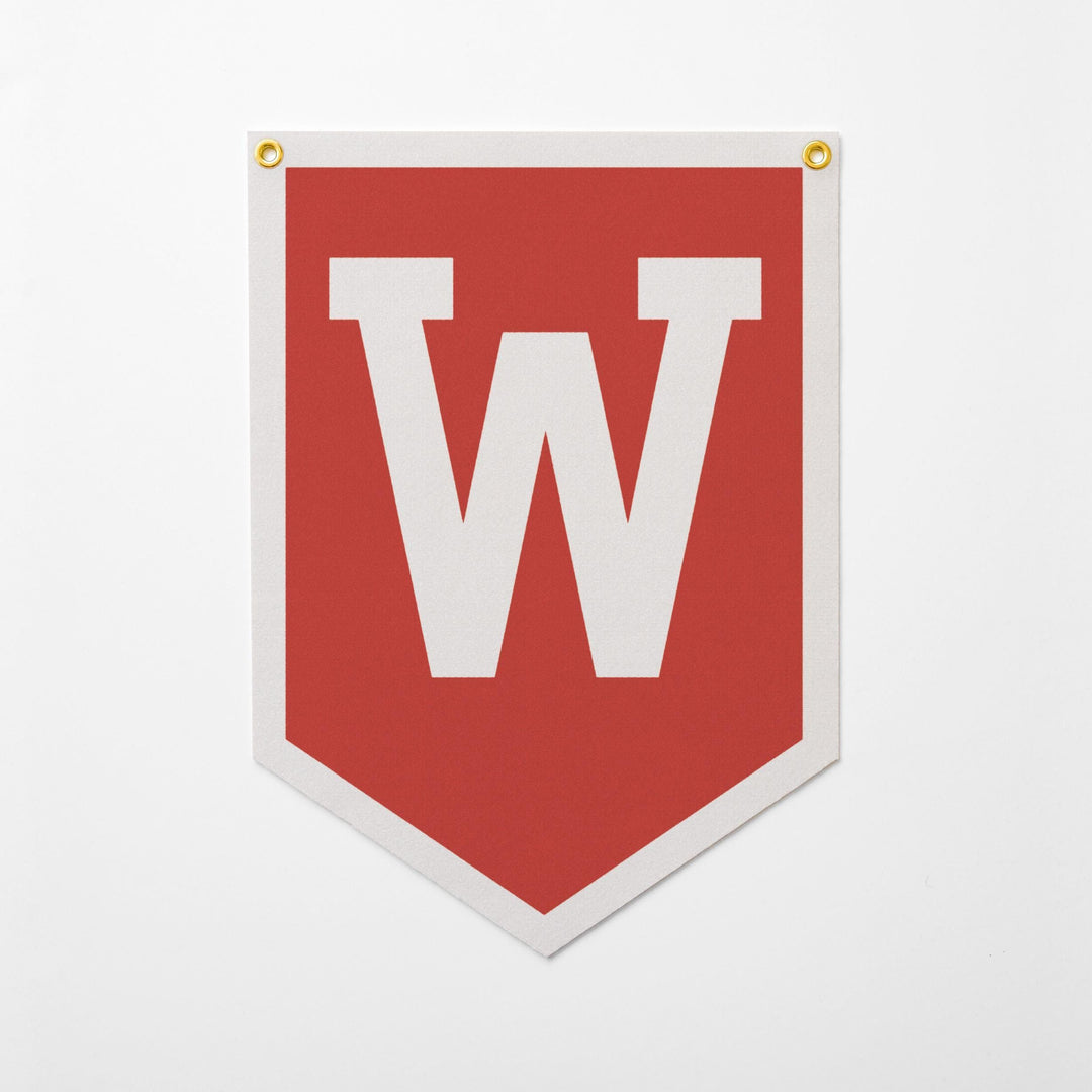 A red banner with a large white letter &amp;quot;W&amp;quot; on it.
