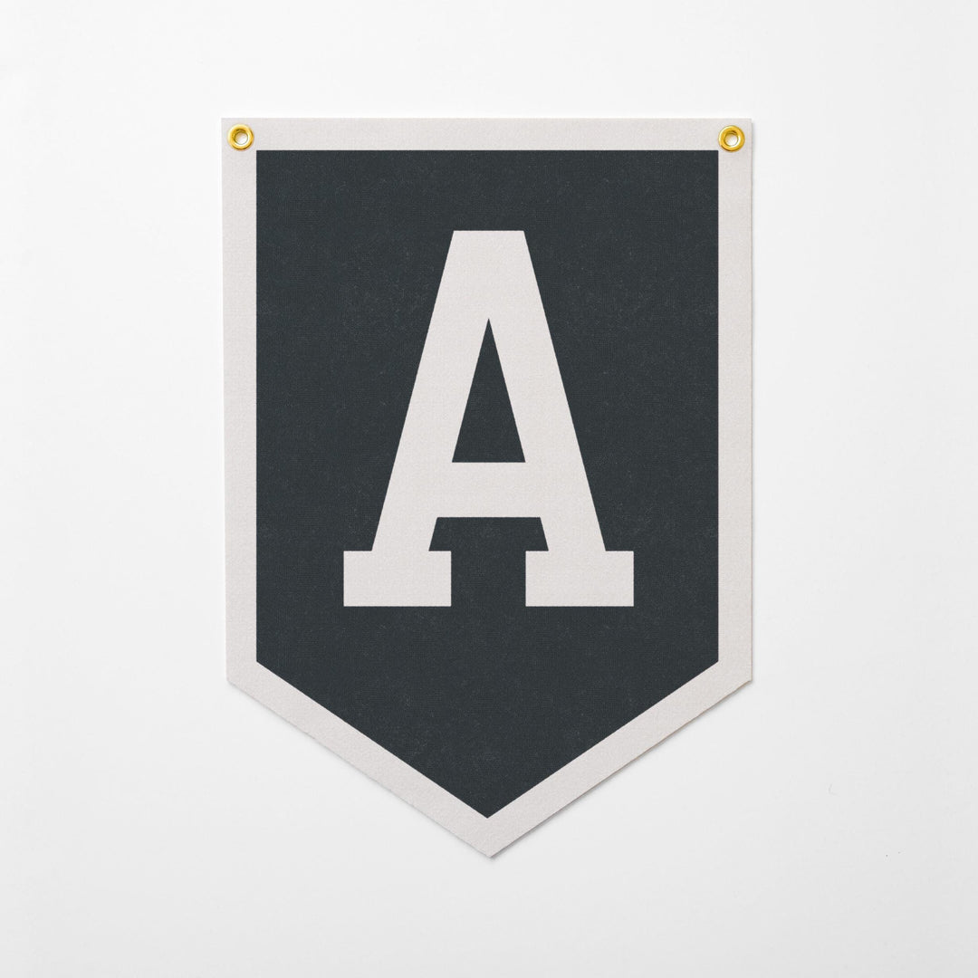 A black and white banner with a large white letter &amp;quot;A&amp;quot; displayed prominently in the center.