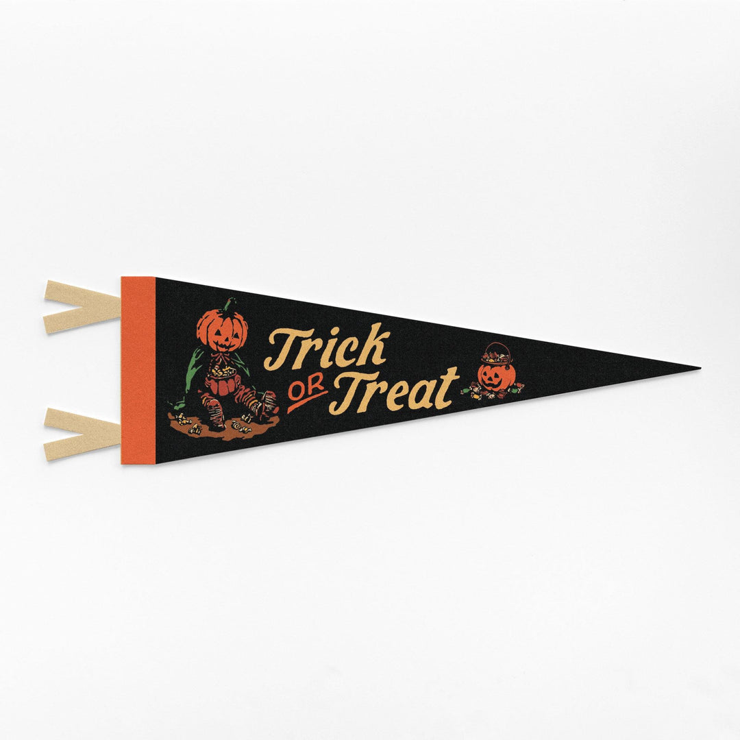 A triangular black pennant flag with wooden sticks, featuring &