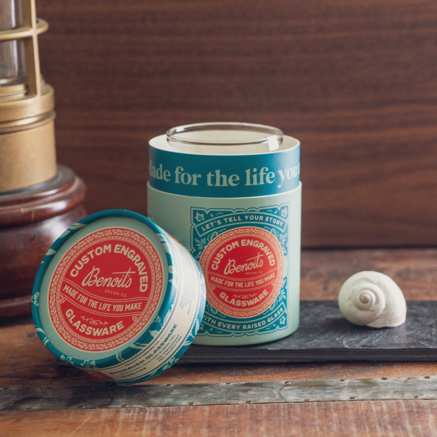 a couple of tins sitting on top of a wooden table