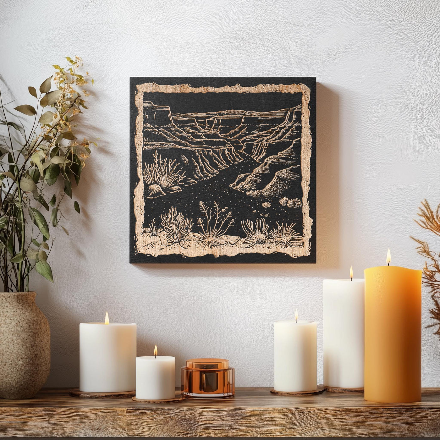 a table topped with candles and a painting on the wall