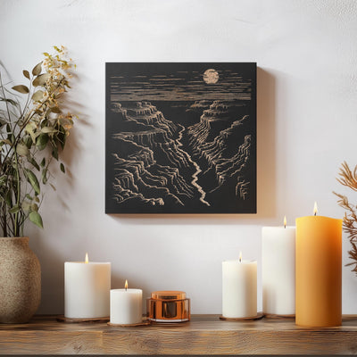 a table topped with candles and a painting on the wall