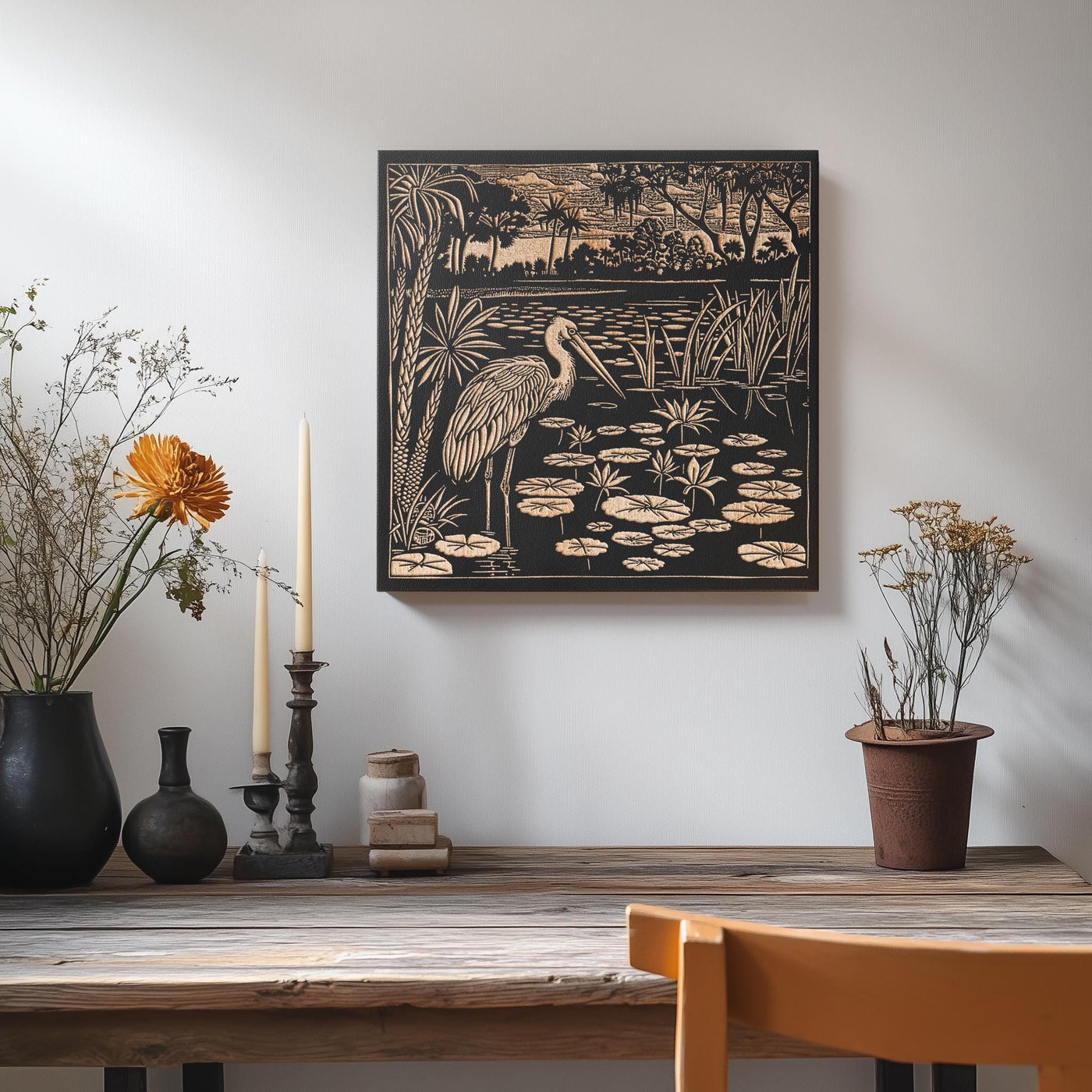 a table with vases of flowers and a painting on the wall