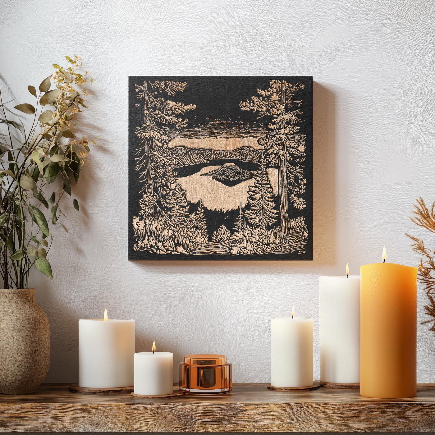 a table topped with candles and a painting on the wall