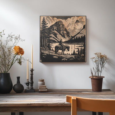 a picture of a mountain scene on a wall above a table