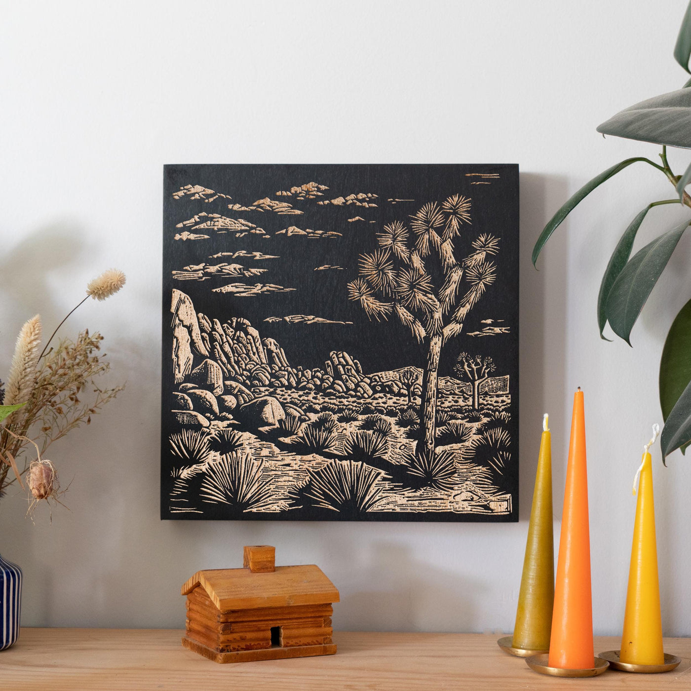 a picture of a desert scene on a wall