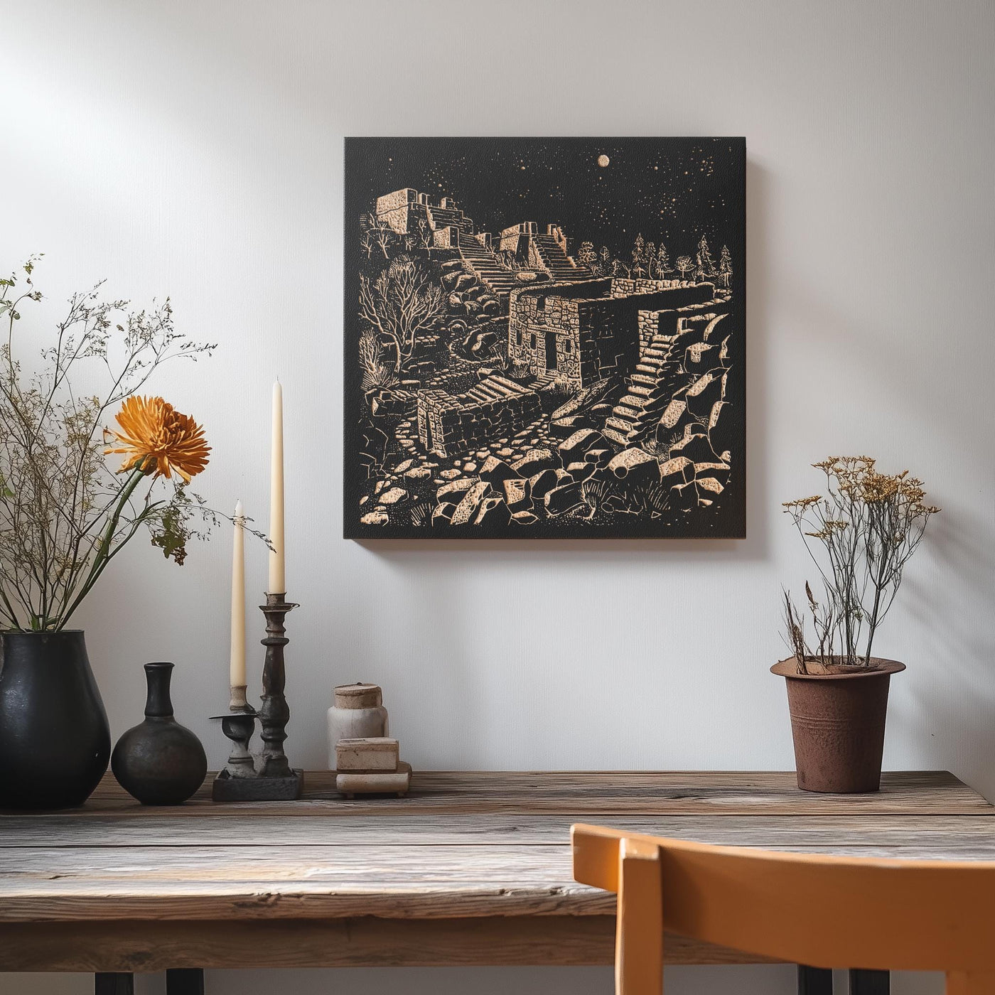 a table with vases of flowers and a painting on the wall