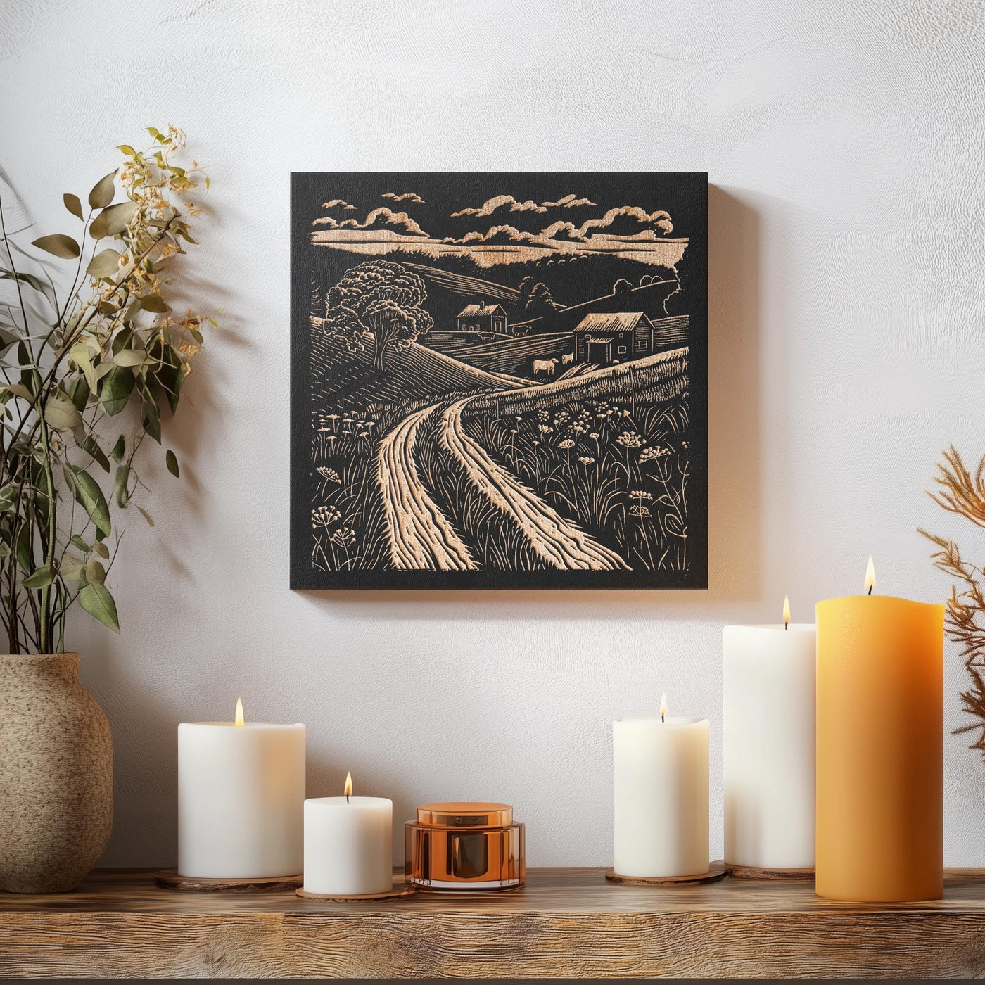 a table topped with candles and a painting on the wall