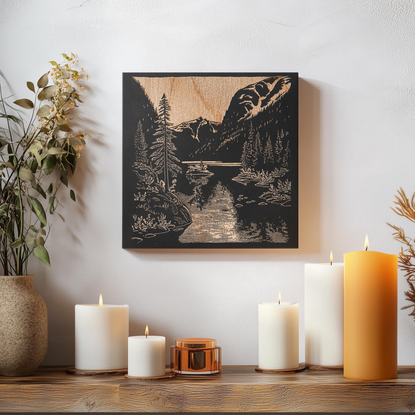 a wooden table topped with candles and a painting