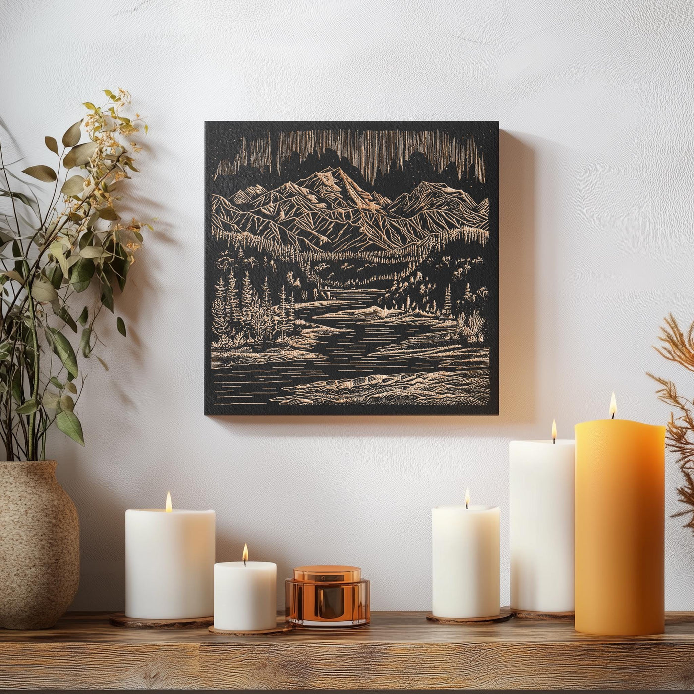 a wooden table topped with candles and a painting