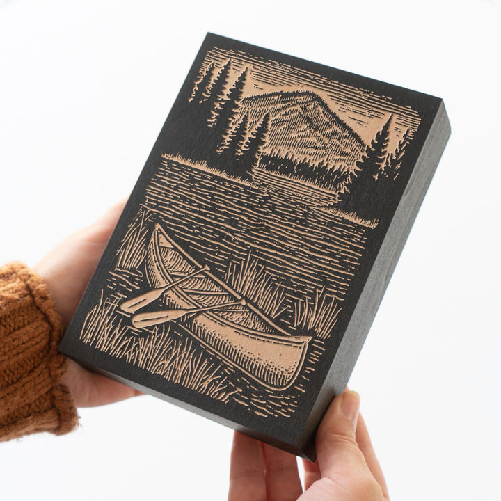 Canoe on Lake Shore Engraved Wood Panel