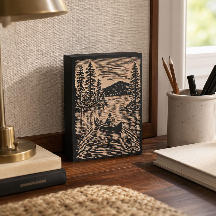 Canoer on Serene Lake Engraved Wood Panel