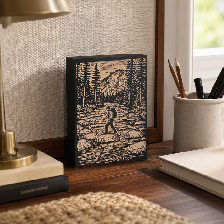 Hiker Crossing River Engraved Wood Panel