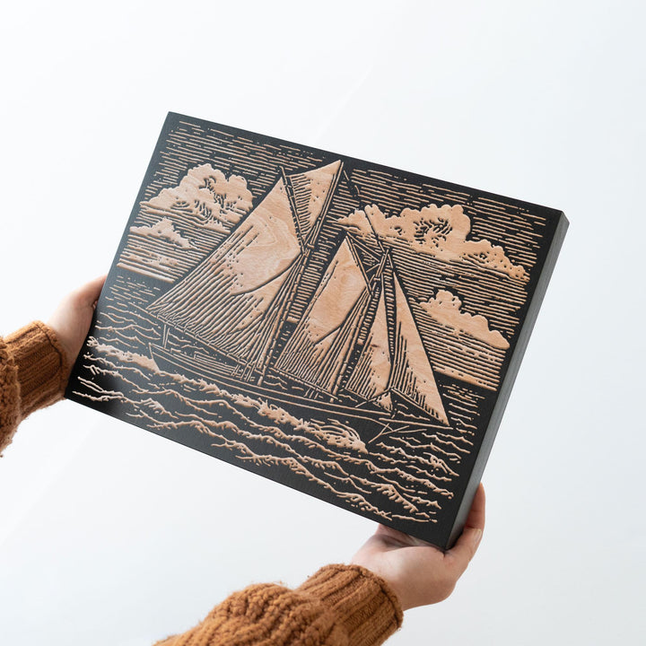 Schooner Under Open Sky Engraved Wood Panel