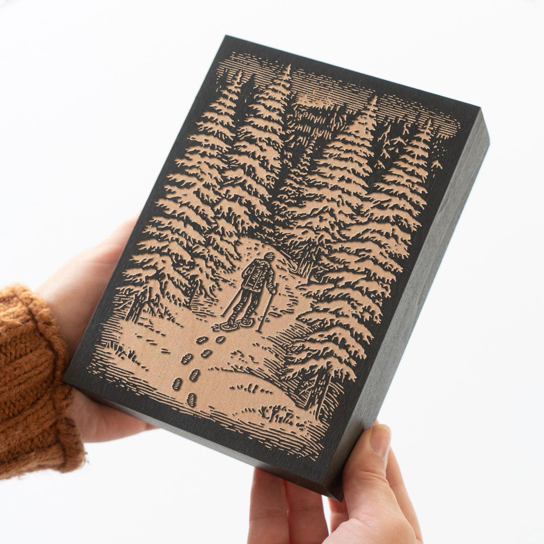 Snowshoer in Winter Woods Engraved Wood Panel
