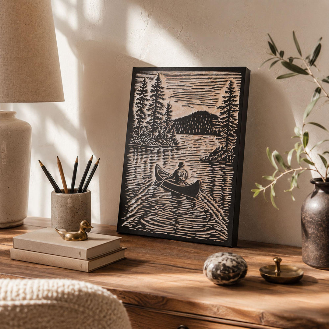 Canoer on Serene Lake Engraved Wood Panel