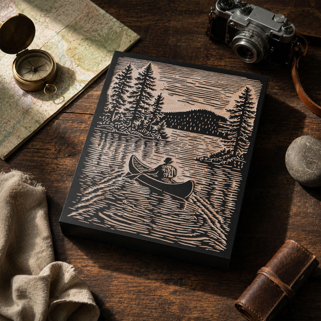 Canoer on Serene Lake Engraved Wood Panel